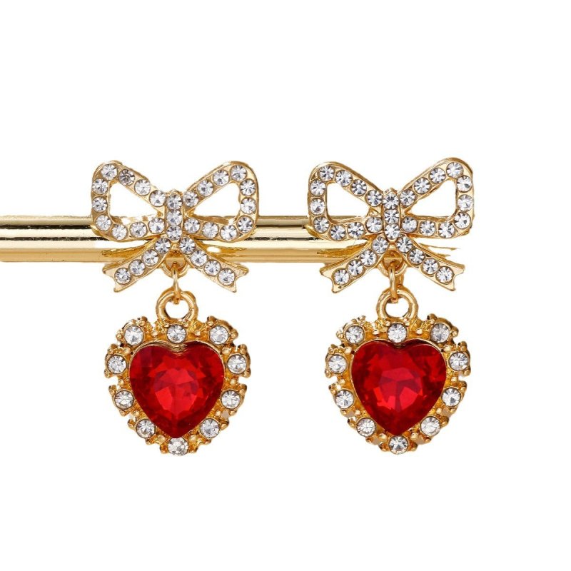 Zinc Alloy Bow Heart Shape With Diamond Earrings $9.84 Dana Fashion Color: Blue Loving Heart Women's Accessories Product information: Color: blue loving heart, pink love, Red Love, purple love, Rose Red Love Material: zinc alloy Shape: heart-shaped, Bow P