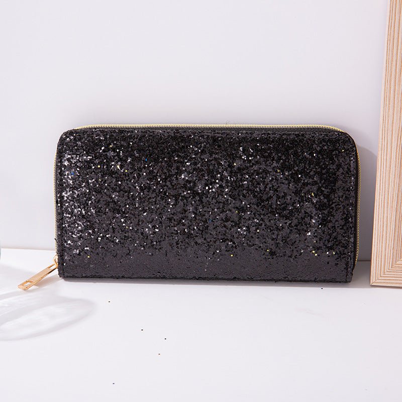 Zipper Student Korean Multi-functional Wallet $16.19 Dana Fashion Color: Black Women's Bags Product information: Color: blue, black, pink, emerald green, silver, gold, navy blue, leather pink Material: PU leather Popular elements: Sequins Length: medium l