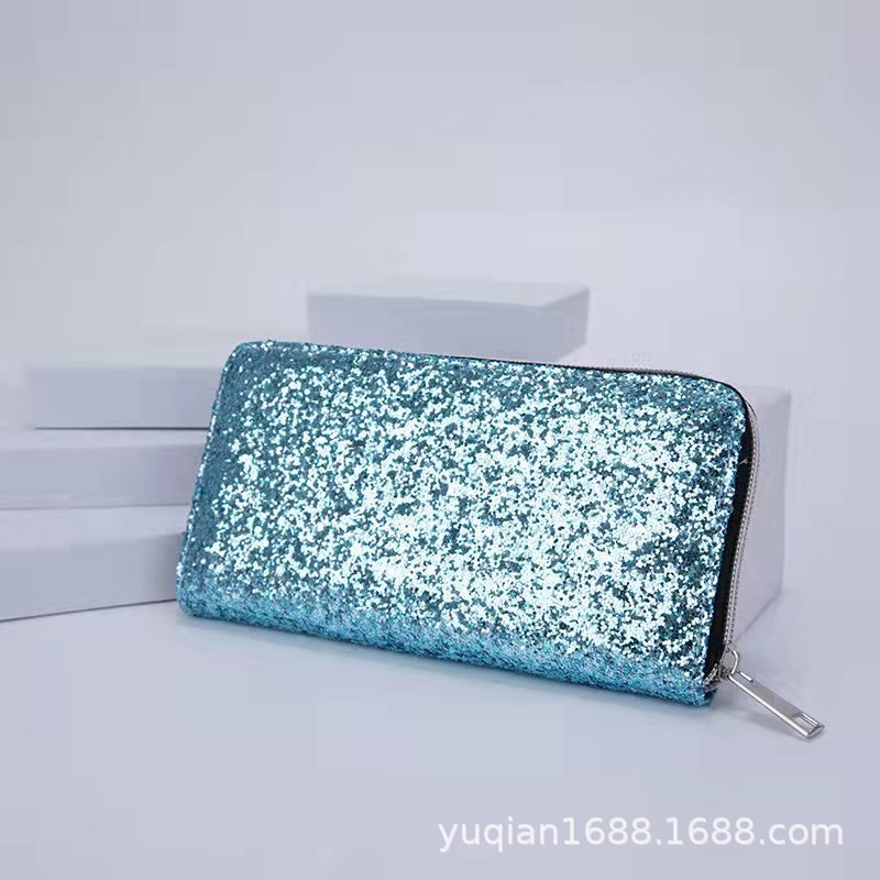 Zipper Student Korean Multi-functional Wallet $16.19 Dana Fashion Color: Emerald Green Women's Bags Product information: Color: blue, black, pink, emerald green, silver, gold, navy blue, leather pink Material: PU leather Popular elements: Sequins Length: