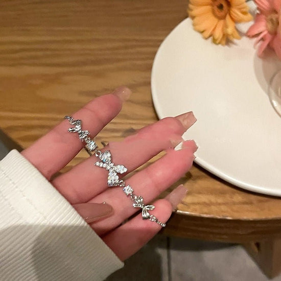 Zircon Bow Pull Adjustable Bracelet $7.50 Dana Fashion Color: Silver Bracelet Women's Accessories Product information: Color: zircon butterfly silver bracelet, 9*9 packing box Applicable people: women Style: Women's Material: Alloy Shape: Bow Popular elem