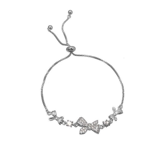 Zircon Bow Pull Adjustable Bracelet $7.50 Dana Fashion Color: Silver Bracelet Women's Accessories Product information: Color: zircon butterfly silver bracelet, 9*9 packing box Applicable people: women Style: Women's Material: Alloy Shape: Bow Popular elem