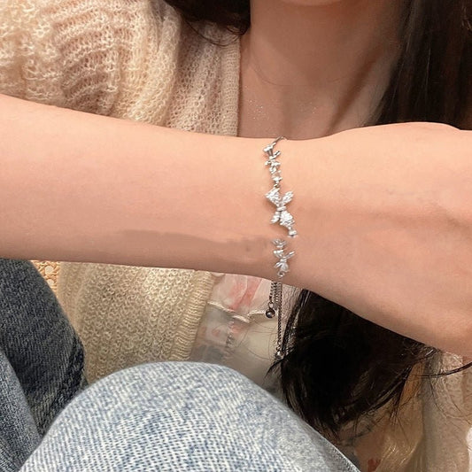 Zircon Bow Pull Adjustable Bracelet $7.50 Dana Fashion Color: Silver Bracelet Women's Accessories Product information: Color: zircon butterfly silver bracelet, 9*9 packing box Applicable people: women Style: Women's Material: Alloy Shape: Bow Popular elem