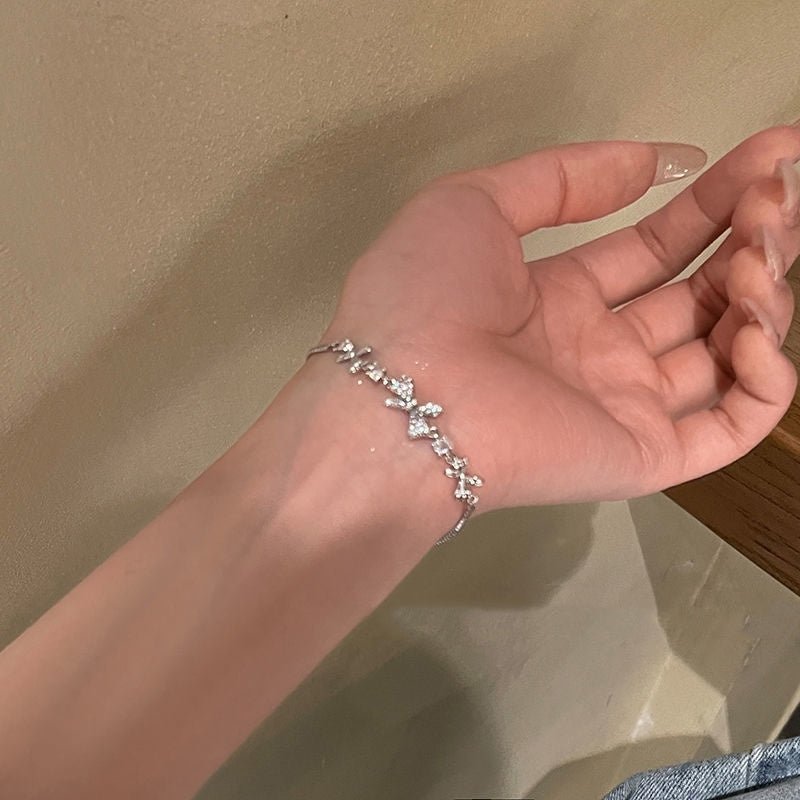 Zircon Bow Pull Adjustable Bracelet $7.50 Dana Fashion Color: Silver Bracelet Women's Accessories Product information: Color: zircon butterfly silver bracelet, 9*9 packing box Applicable people: women Style: Women's Material: Alloy Shape: Bow Popular elem