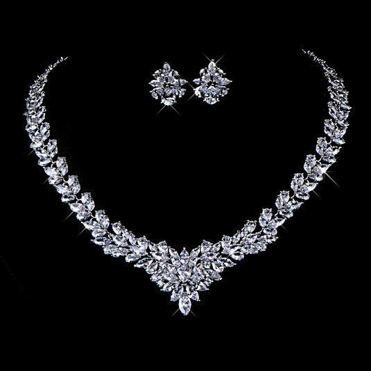 Zircon Flower Stud Necklace Set $49.50 Dana Fashion Color: Blue Women's Accessories Style: Korean Material: Copper Processing technology: gem setting Set combination: earrings + items Setting material: gold-plated inlaid artificial gems / semi-precious st